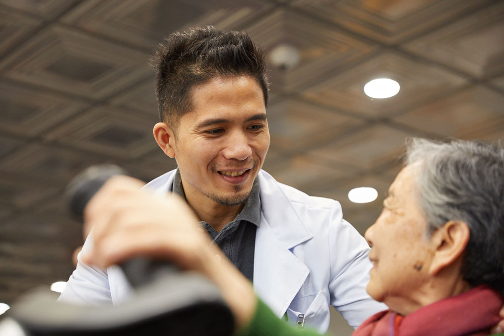 Therapist with a Patient Hypertension care at Fairview rehab in queens nyc