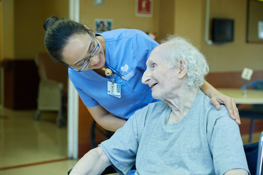 Vascular Ulcers A nurse taking care of a patient suffering from vascular ulcers at Fairview Rehab & Nursing Home