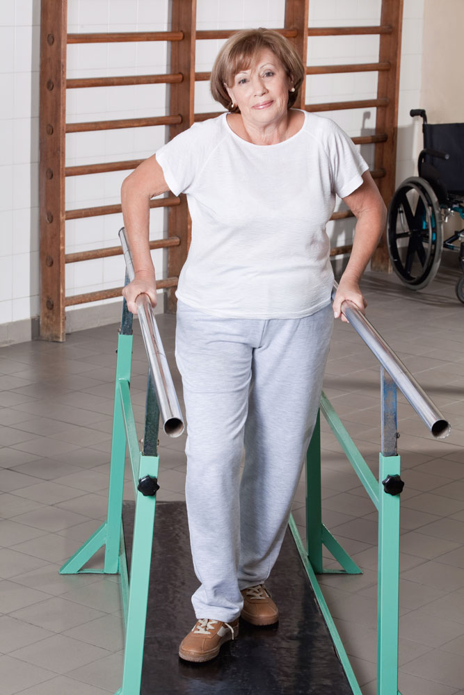 Outpatient Rehabilitation Services Senior woman having ambulatory therapy as a part of outpatient rehabilitation service.