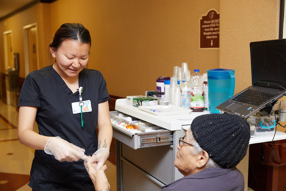 Elderly women getting nursing care to avoid pneumonia