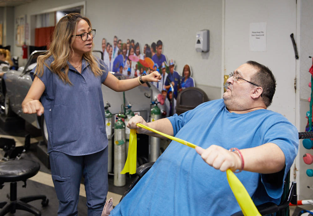 Man getting physical therapy for better healing after surgery