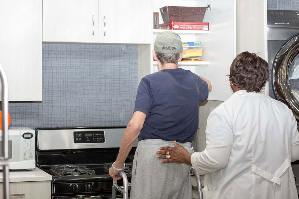 Senior man with arthiritis getting occupational therapy at Fairview Rehab