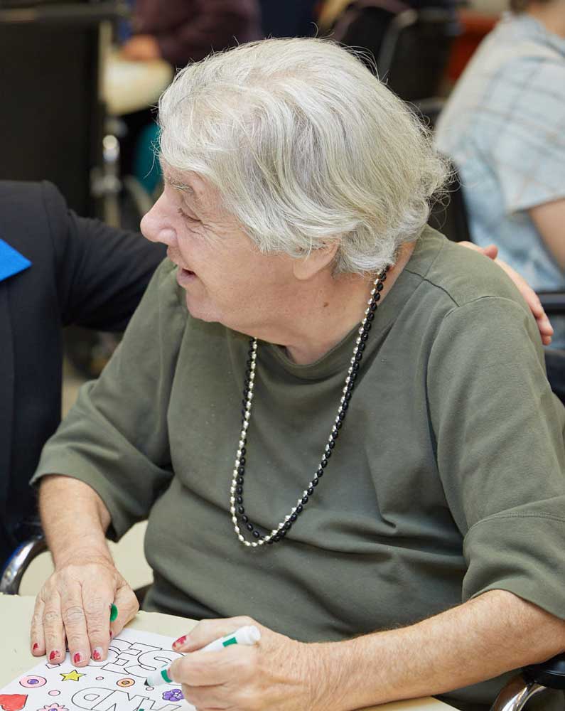 Elderly women taking part in arts and crafts activities arranged at Fairview Rehab