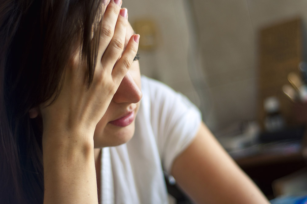 Brain Fog Young women suffering from brain fog