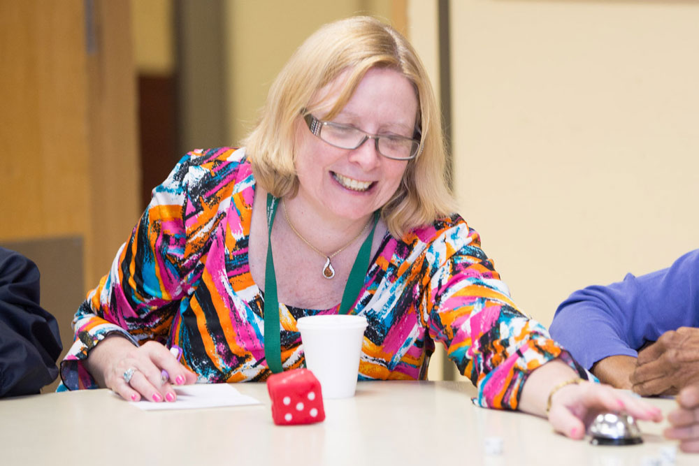 Senior women playing mind games as a part of therapeutic recreation program