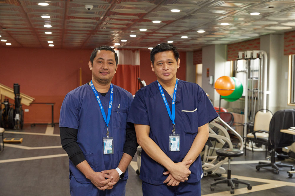 Physical Therapy Staff – Fairview Rehab Physical therapists portrait inside the gym. Physical therapy to keep our residents active and fix poor mobility.