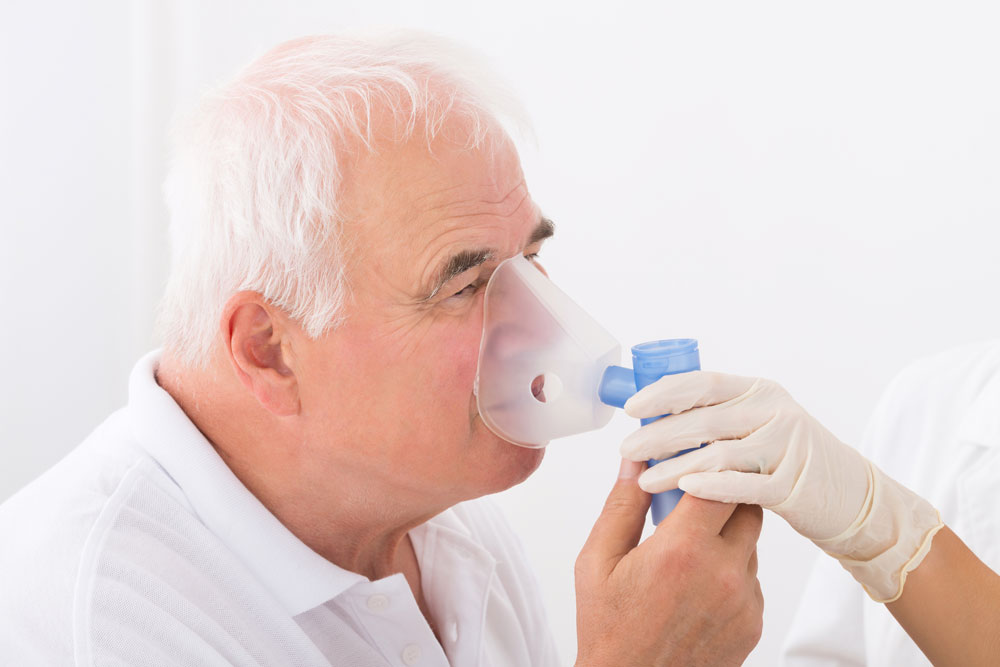 Elderly main suffering from Chronic obstructive pulmonary disease (COPD) flare ups using spacer.